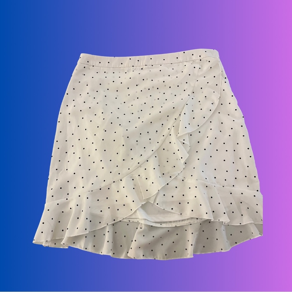 White asymmetrical mini poka dot skirt